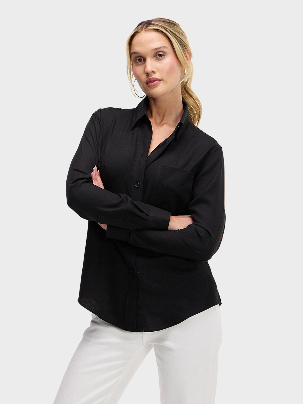 Button down shirts for women by Sarah Alexandra, designer of luxury womens clothing. Button-down shirt features two-piece collar, front pocket, and beveled placket.