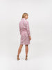 Back of a luxury long sleeve pink and white shirt dress