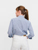 Back of woman with blue polka dot broadcloth button-down